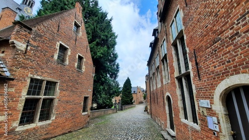 Historical streets with cobble-stones in Groot Begijnhof (Great Beguinage) in Leuven, Belgium. The beguinage dates from the 13th century.
