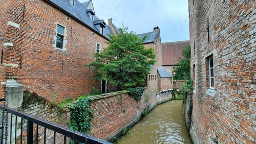 Canal in Groot Begijnhof (Great Beguinage) in Leuven, Belgium. The beguinage dates from the 13th century.