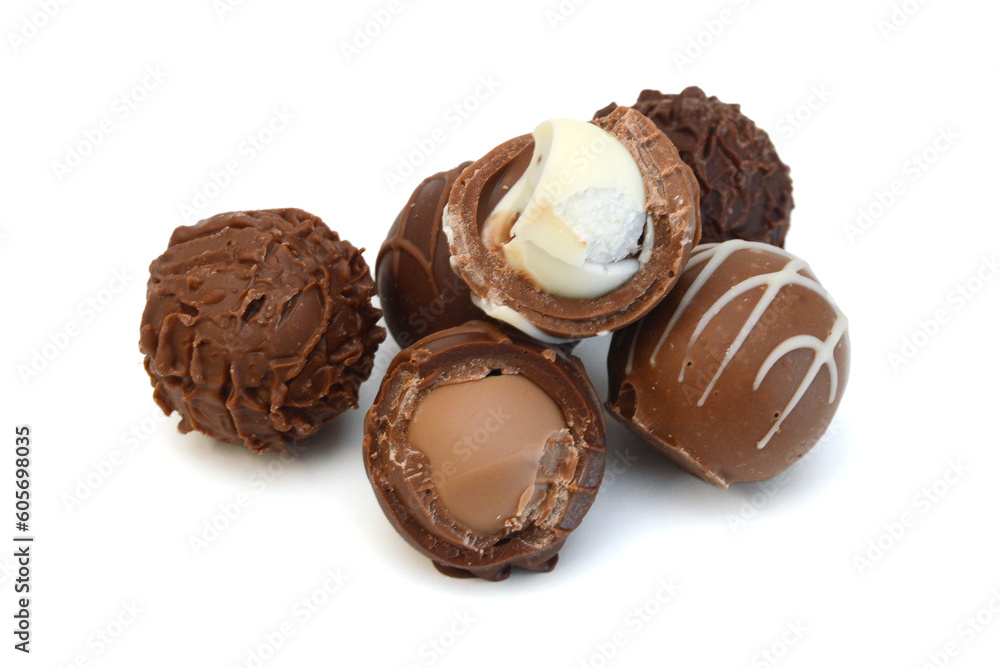 Obraz premium Chocolate candies collection. Beautiful Belgian truffles isolated on white background