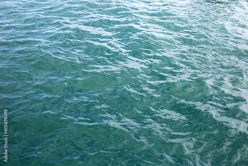 Blue sea water surface texture. Blue ocean summer