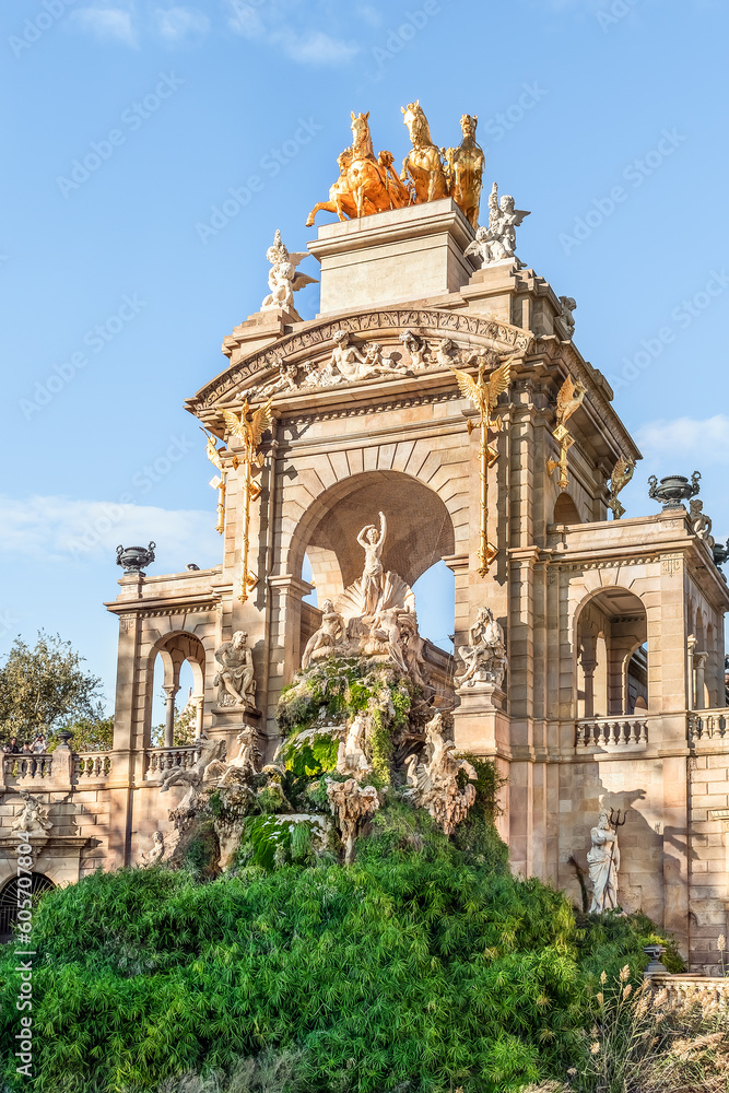 Barcelona, Spain - November 26,2021: Triumphal Arch with statues of ancient Roman gods in Cascada Fountain in Parc de la Ciutadella in Barcelona, Spain. Sculptural composition by Josep Fontsere, 1888