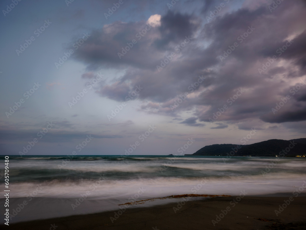 clouds over the beach long expossure beach in baler aurora philippines