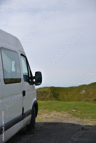Camper van parked up looking at a scenic view.  © dabyg