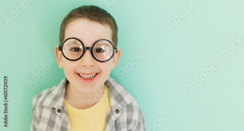 Caucasian boy in eyeglasses copy space