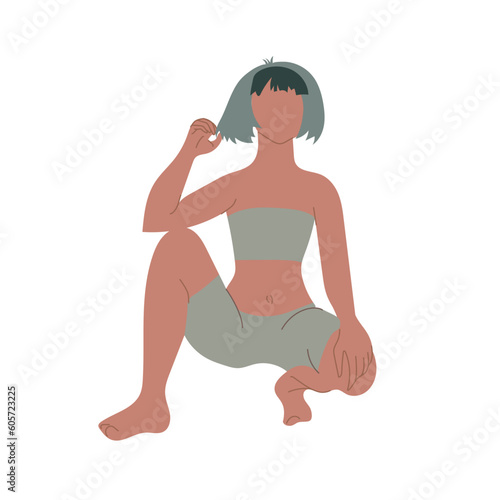 Teenage girl squatting isolated on white background.