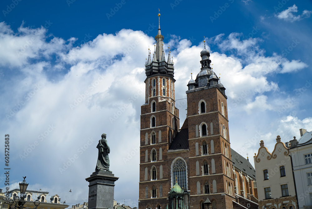 St. Mary's Basilica in Kraków, Poland on a partly cloudy day