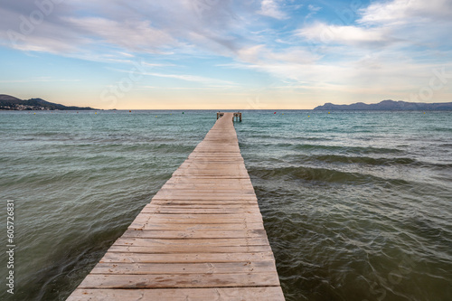 A long wooden deck in Muro Beach. the longest sandy beach in Majorca Island. © Marcos