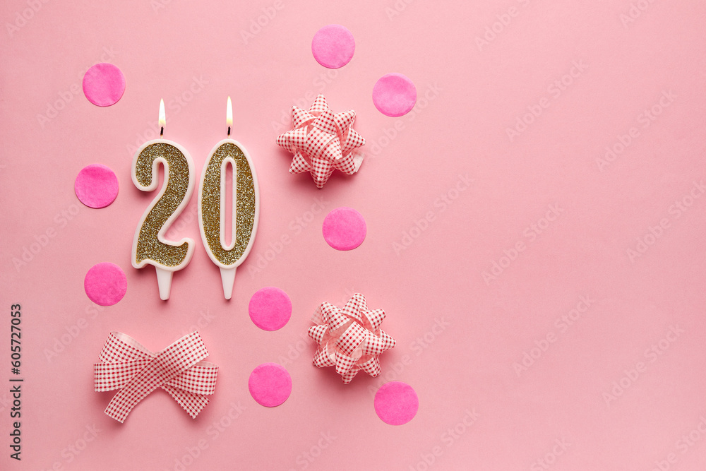 Number 20 on pastel pink background with festive decor. Happy birthday candles. The concept of celebrating a birthday, anniversary, important date, holiday. Copy space. Banner Number 20 on pastel pink background with festive decor. Happy birthday candles. The concept of celebrating a birthday, anniversary, important date, holiday. Copy space. Banner