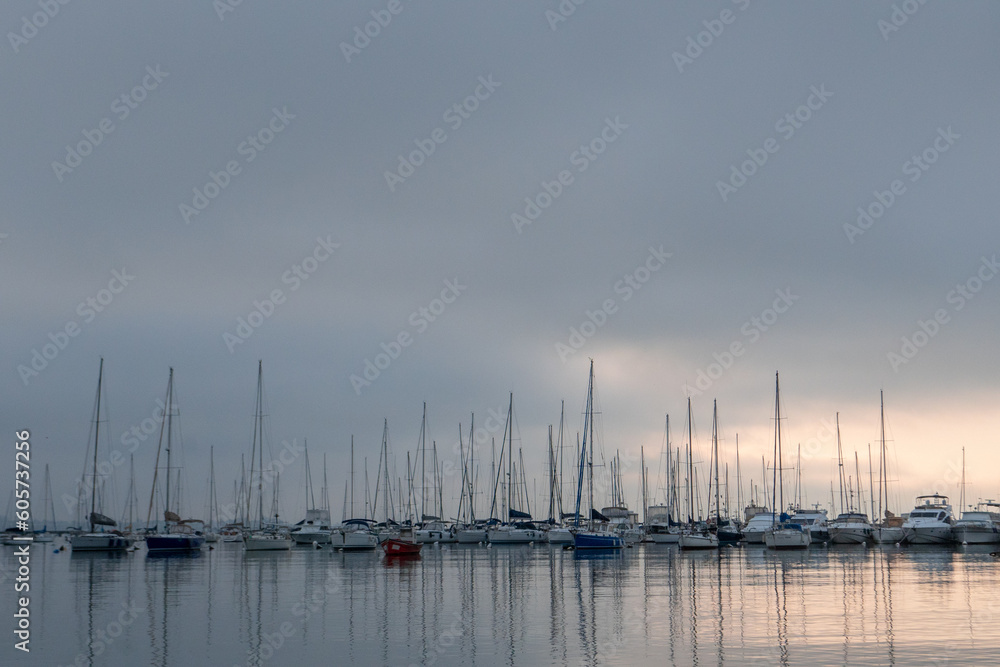 Fototapeta premium Sunrise at the Puertito del Buceo in the coastal Rambla of Montevideo capital of Uruguay in 2023.