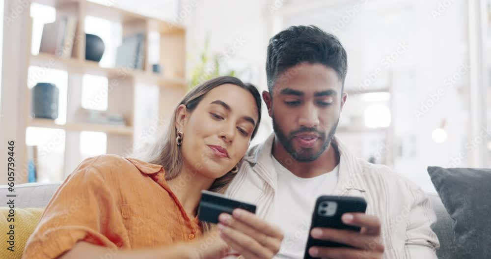 Couple, sofa and phone with credit card for ecommerce, fintech app and payment on web in home. Man, woman and smartphone with online shopping, personal info or discussion with e commerce on internet Couple, sofa and phone with credit card for ecommerce, fintech app and payment on web in home. Man, woman and smartphone with online shopping, personal info or discussion with e commerce on internet
