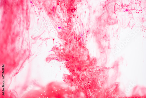 viva magenta colored smoke on a white background