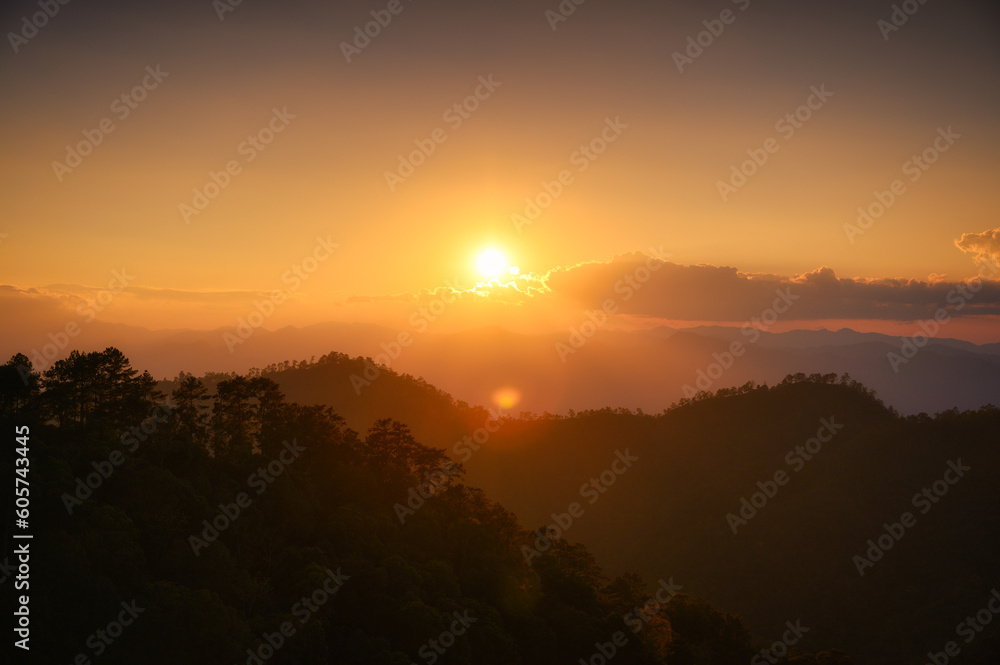 Sunset over mountain in tropical rainforest at national park