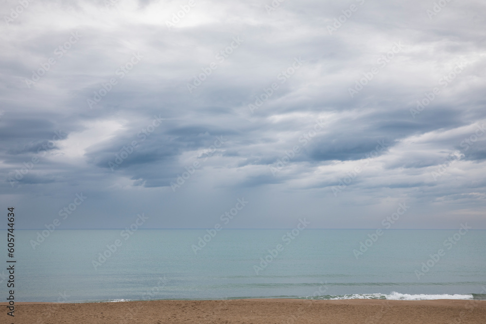 Italian maritime landscape on a gray spring day. Very cloudy sky Italian maritime landscape on a gray spring day. Very cloudy sky