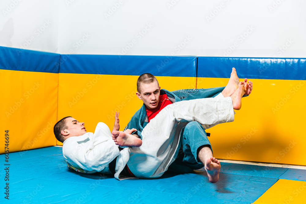 Brazilian jiu-jitsu and grappling training for men in a self-defense gym Brazilian jiu-jitsu and grappling training for men in a self-defense gym