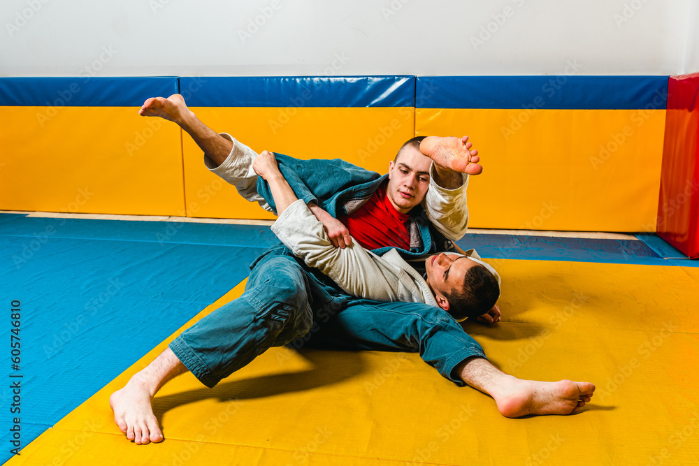 Brazilian jiu-jitsu and grappling training for men in a self-defense gym Brazilian jiu-jitsu and grappling training for men in a self-defense gym