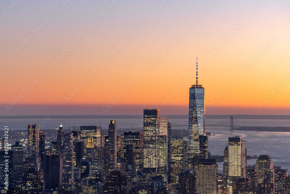 downtown Manhattan during orange sunset