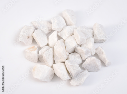 Dolomite mineral stones heep on white background.