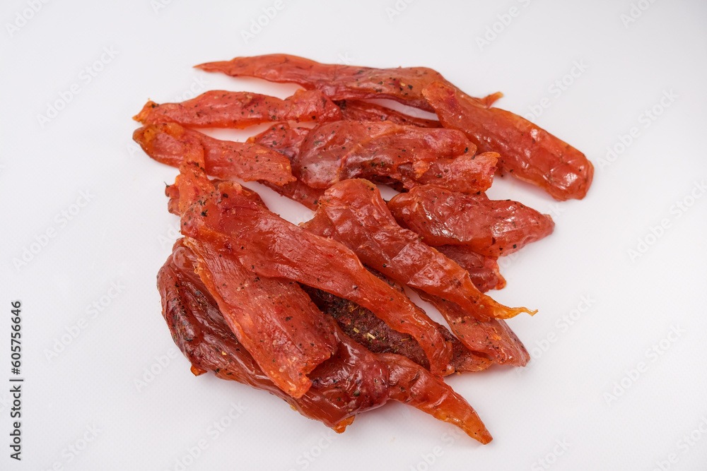 Chicken jerky. dried chicken meat isolated on white background. Beer snack Chicken jerky. dried chicken meat isolated on white background. Beer snack