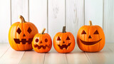 Four Halloween pumpkins or Jack O lanterns on a wooden background. The Jack O' Lantern is carved with the traditional eyes, nose and smile. Halloween background. copy space. AI Generative AI