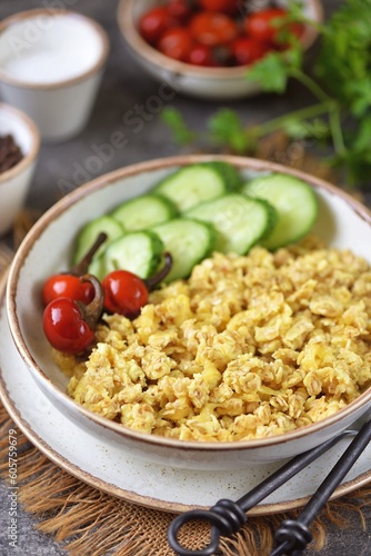 Oatmeal with eggs and vegetables. Healthy breakfast.