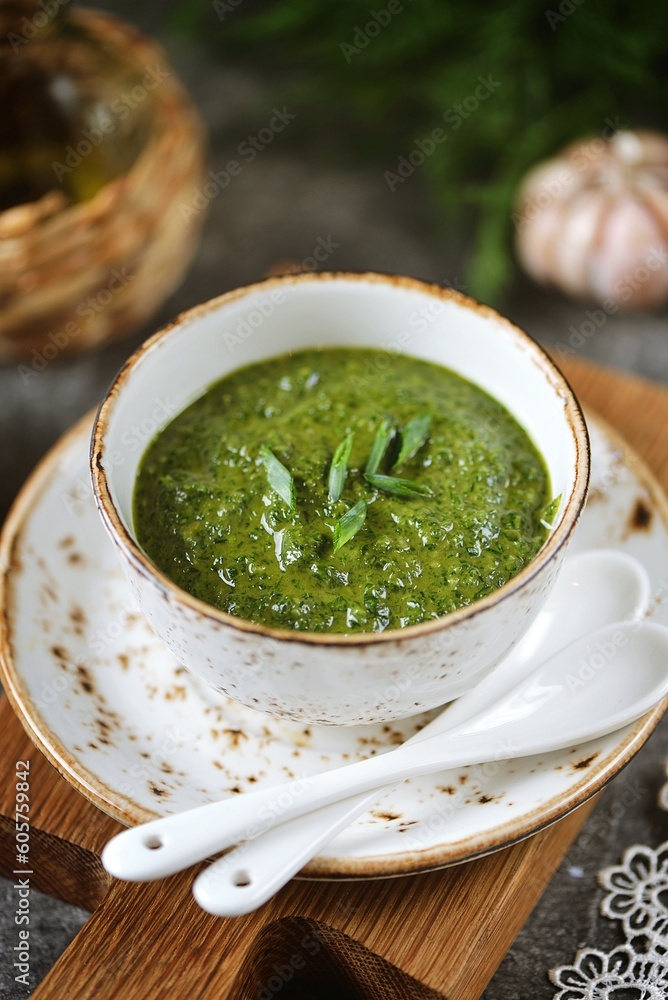 Homemade pesto sauce with parsley and hot peppers.