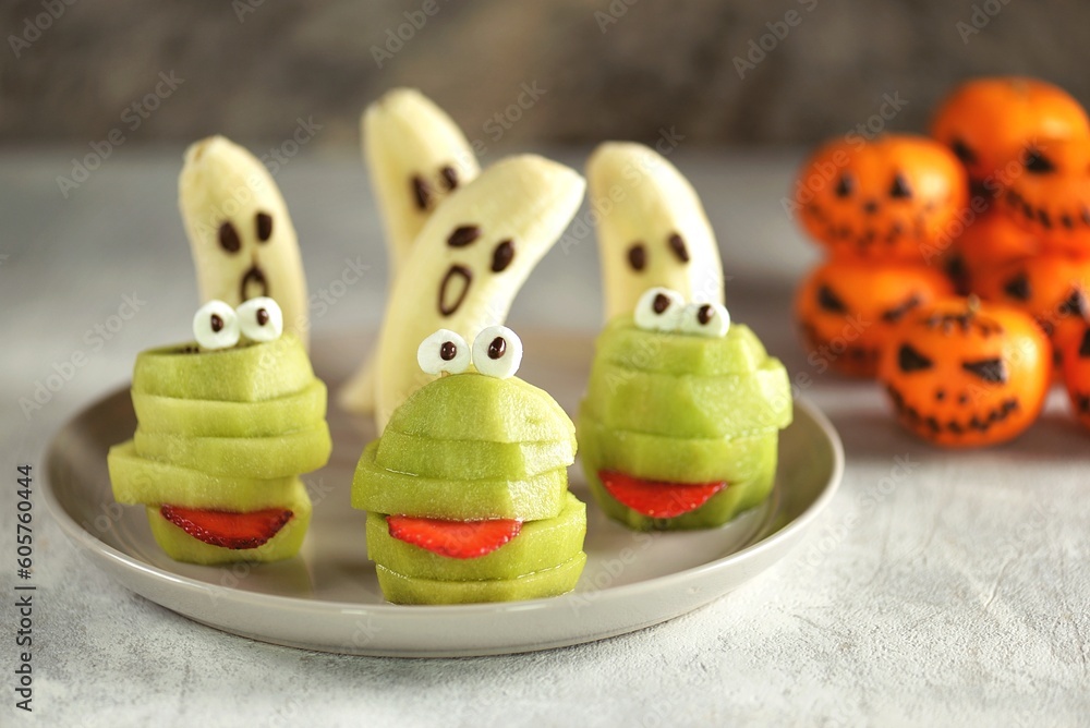 banana ghosts and spooky green kiwi monsters for Halloween party