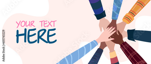 Hands laid on each other. Different people join hands for teamwork. General goal at work. Friendship and help to each other in unity, the strength of the team