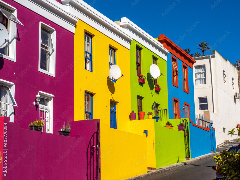 Naklejka premium Colorful homes of Bo-Kaap in Capetown, South Africa, with deep blue sky in background.