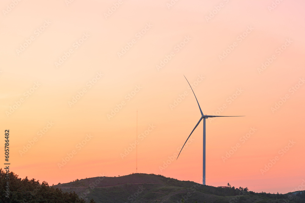 Wind turbines being hoisted and under construction Wind turbines being hoisted and under construction