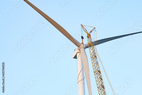 Wind turbines being hoisted and under construction