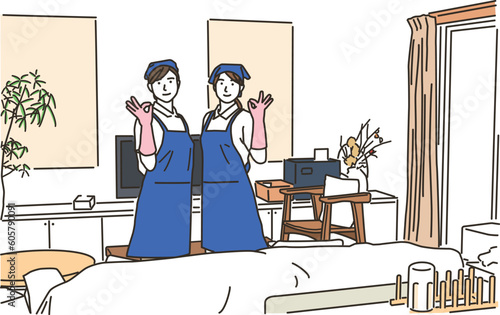 OKポーズをするハウスキーパーの女性達