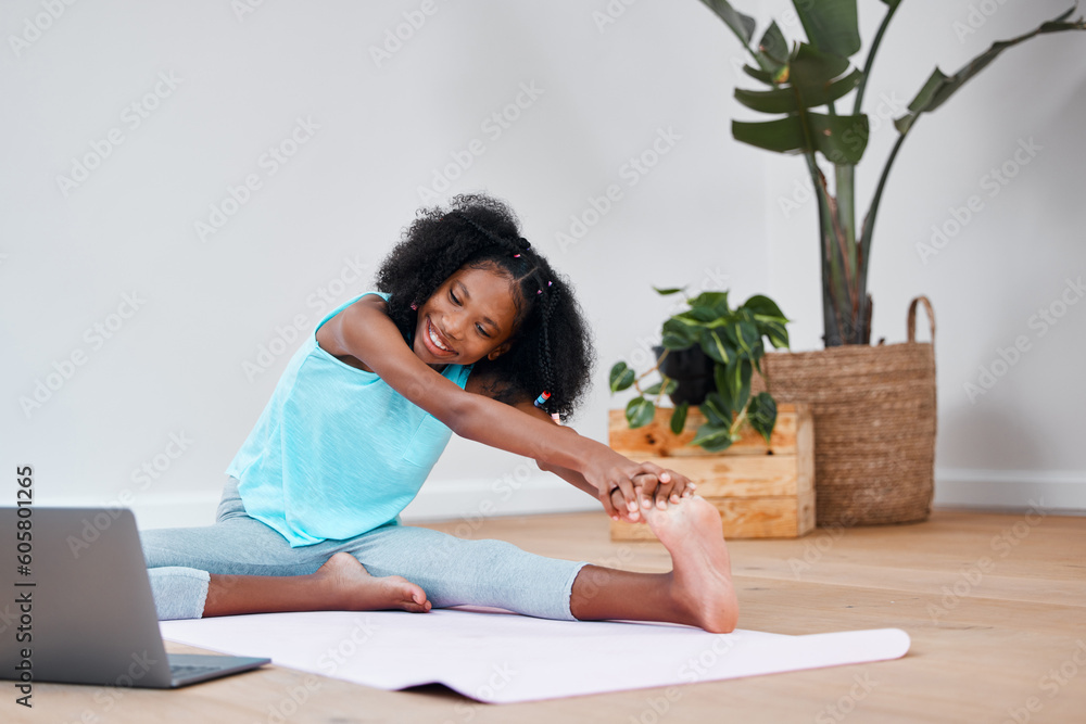 Laptop, yoga and girl child doing exercise with an online tutorial for health, wellness and fitness. Technology, meditation and kid stretching for pilates workout with video on internet with computer