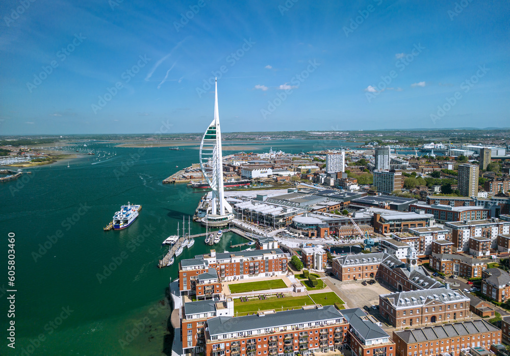 The drone aerial view of Spinnaker Tower and Portsmouth Harbour. Portsmouth is a port city and unitary authority in Hampshire, England. 