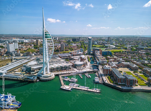 The drone aerial view of Spinnaker Tower and Portsmouth Harbour. Portsmouth is a port city and unitary authority in Hampshire, England.  photo