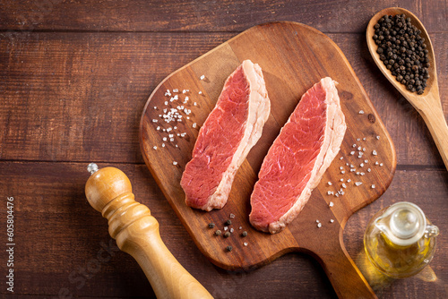 Raw picanha steak on the cutting board.