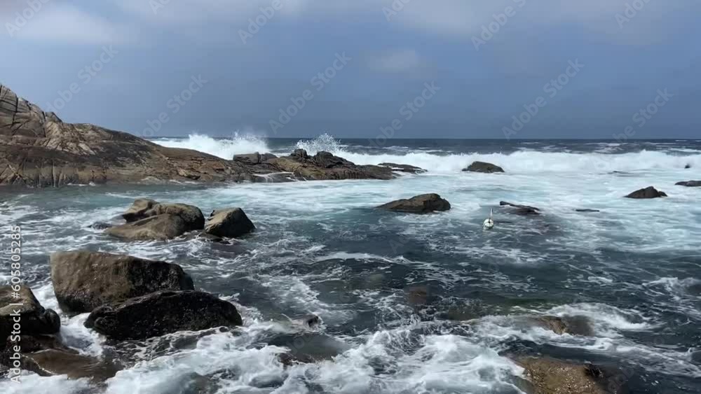 Waves on rocks coast wind Waves on rocks coast wind