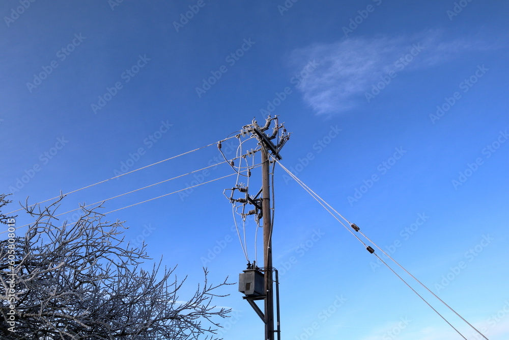Power lines during the winter. Covered in frost. Skara, Sweden. Power lines during the winter. Covered in frost. Skara, Sweden.