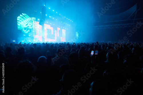people dancing at an electronic music concert