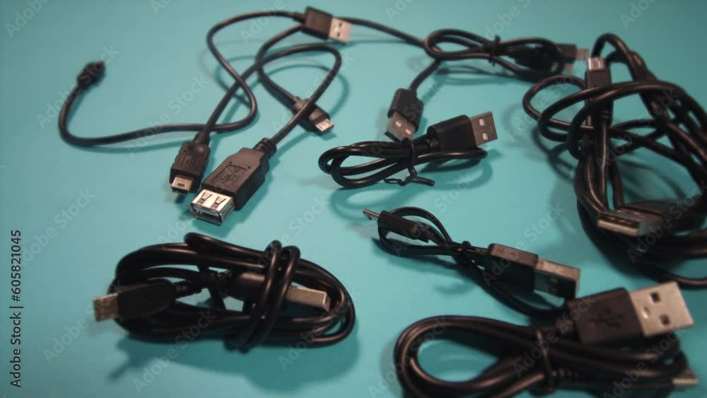 kit of different USB adapters lying on green background kit of different USB adapters lying on green background