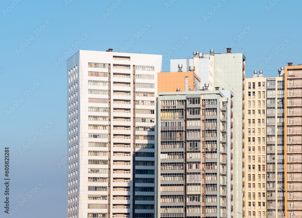 urban landscape, a group of high-rise residential buildings against the sky
