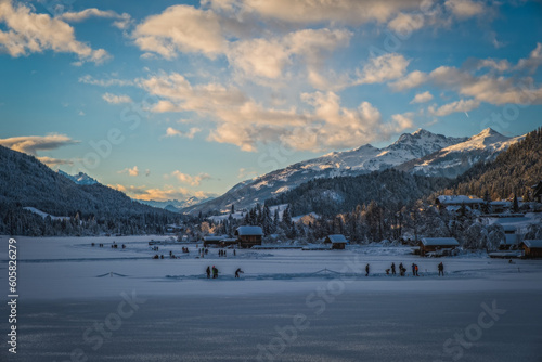 Weissensee, Carinthia, Austria - January, 2022: Frozen lake Weissensee on a cold day in winter © Сергій Вовк