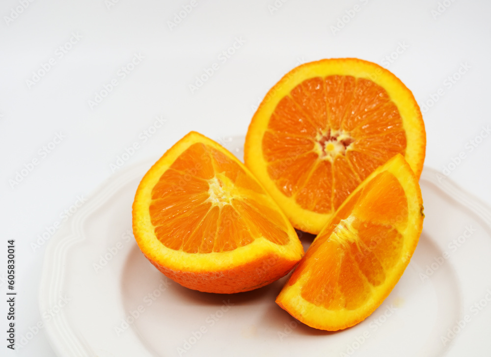oranges on a plate oranges on a plate