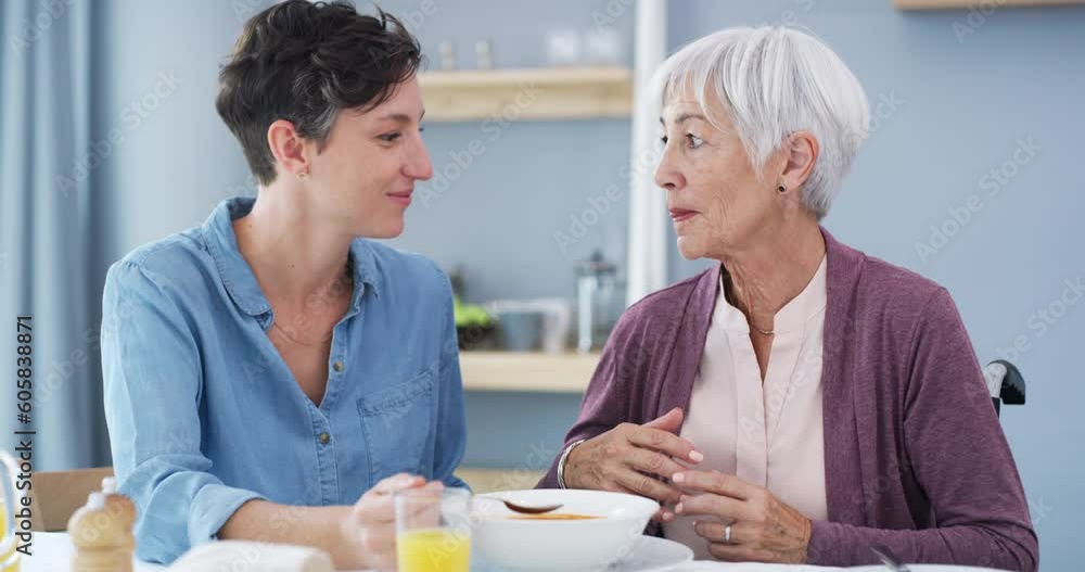 Feeding, elderly care and woman at breakfast with retirement help and support. Nursing home, senior female person and eating assistance of a old lady and caretaker with heathy food at a table
