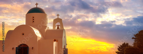 Cyprus. Protaras. Pernera. Fragment of the Church of St. Nicholas in Cyprus. Bell tower of the white Church with blue domes. Orthodox Church on the Mediterranean coast. Christianity. photo