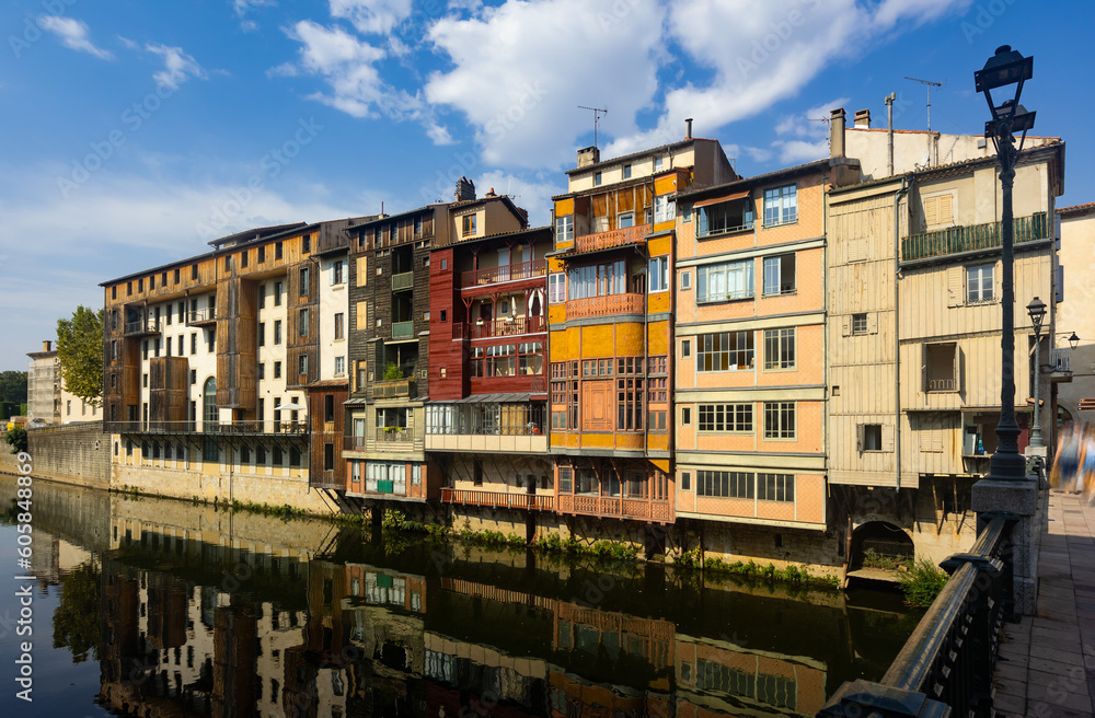 Scenic summer view of typical colorful townhouses on bank of Agout river in French town of Castres known Little Venice of Languedoc