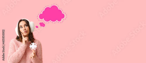 Thoughtful young woman with...