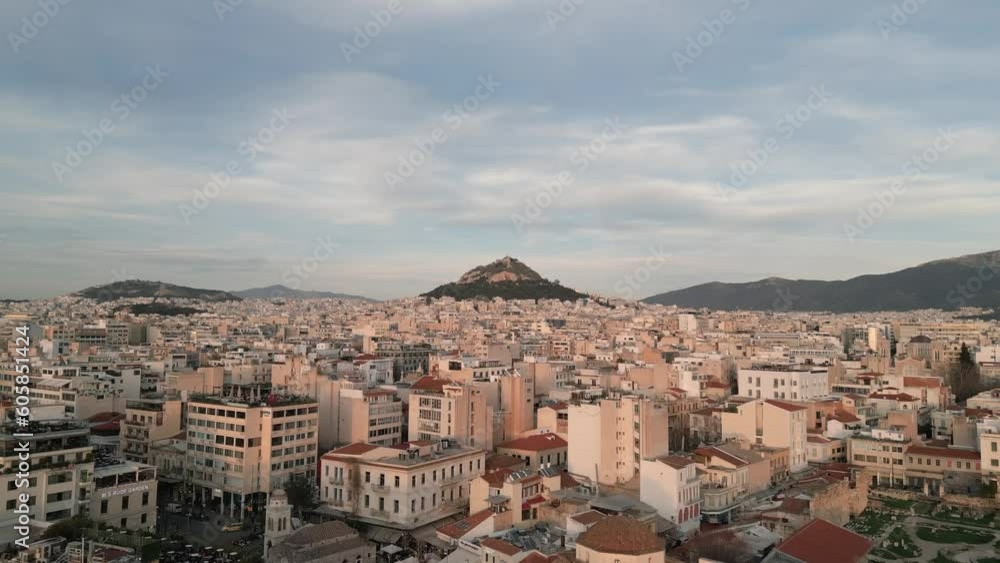 Aerial drone video of Athens urban dense populated cityscape leading to iconic Lycabettus hill Aerial drone video of Athens urban dense populated cityscape leading to iconic Lycabettus hill
