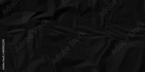 Black fabric wrinkled ripped texture and Crumpled black paper. Textured crumpled black paper background. 