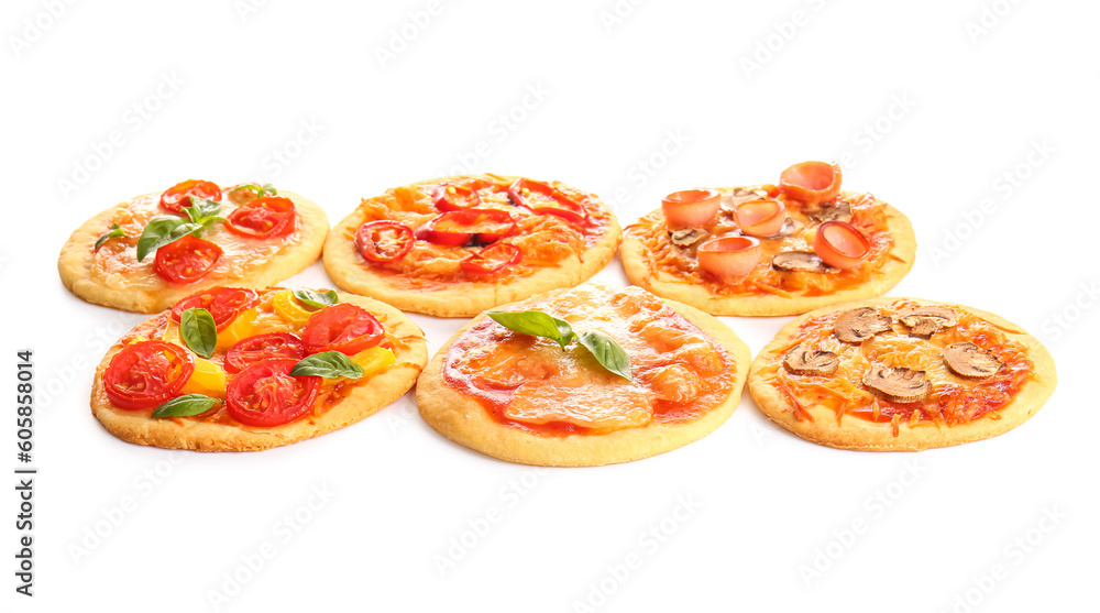 Different tasty mini pizzas on white background Different tasty mini pizzas on white background
