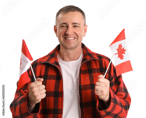 Mature man with flags of Ca...